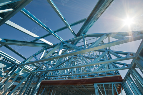 Photo: New home construction framing. New home construction framing.