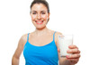 Portrait of a beautiful young adult holding glass of milk