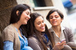 Group of Women Sending Message with Mobile Phone Group of Women Sending Message with Mobile Phone
