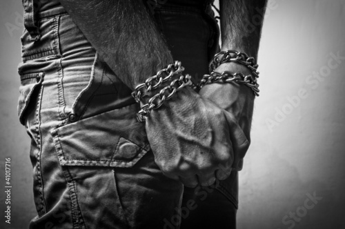 Photo: Hands in chains Hands in chains