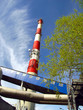chimney, wharf, pipelines, tree and sky
