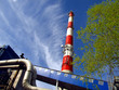 chimney, wharf, pipelines, tree and sky