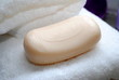 Bar of Soap on White Towels