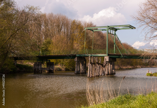 Photo: Small drawbridge in a natural landscape Small drawbridge in a natural landscape