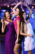 Photo: Young woman having fun at nightclub disco Young woman having fun at nightclub disco