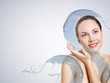Young woman with water splashes