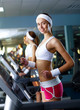 Young woman doing sport in gym
