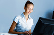 Young woman in business wear and headset
