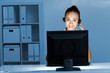 Young woman in business wear and headset