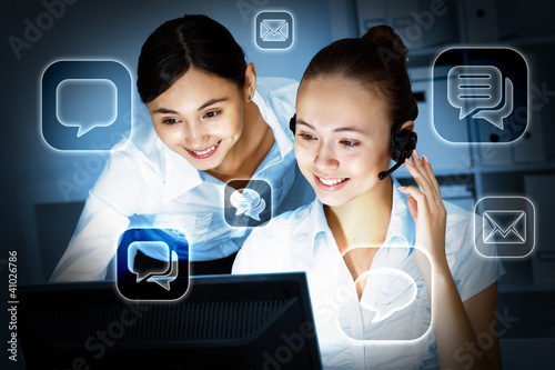 Illustration: Young woman in business wear and headset Young woman in business wear and headset