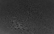 sfondo di gocce d'acqua su pannello nero sfondo di gocce d'acqua su pannello nero