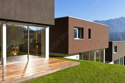 Photo: beautiful modern house with garden, outdoor beautiful modern house with garden, outdoor