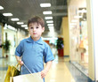 Little boy doing shopping