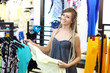 Young girl buying clothes Young girl buying clothes