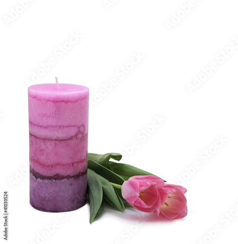 Photo: Large Pink Candle and Tulips Large Pink Candle and Tulips