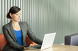 Business woman using a laptop