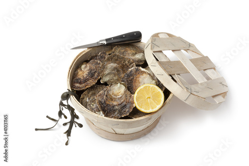 Photo: Fresh European flat oysters in a basket Fresh European flat oysters in a basket