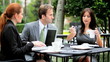 Business Team Informal Meeting at Café Business Team Informal Meeting at Café