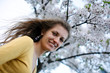 Young woman with spring flowers Young woman with spring flowers