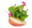 toy apple boat  floats towards the light