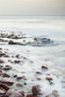 cobble stone beach of Read Sea on sunset