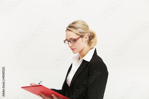 Photo: Conscientious secretary concentrating Conscientious secretary concentrating
