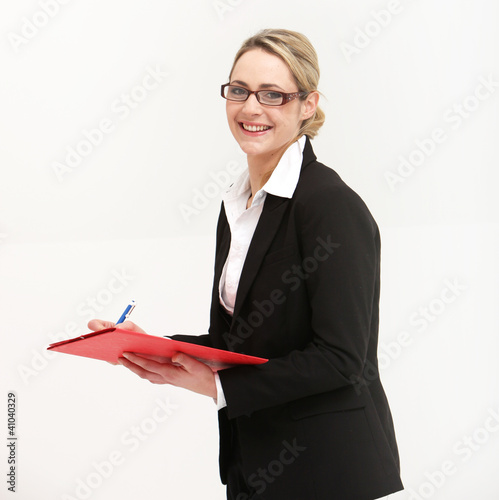 Photo: Smiling friendly secretary or assistant Smiling friendly secretary or assistant