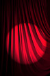 Brightly lit curtains in theatre concept