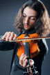 Violin player playing the intstrument Violin player playing the intstrument