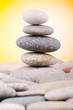 Pebbles stack against gradient background