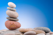 Pebbles stack against gradient background Pebbles stack against gradient background