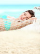 Vacation woman relaxing on beach