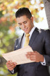Businessman reading the newspaper Businessman reading the newspaper