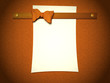 sheet of paper attached to the wall
