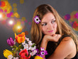 Springtime: young, pretty woman with colorful spring flowers