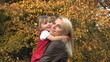 Daughter and mother together at autumn late evening