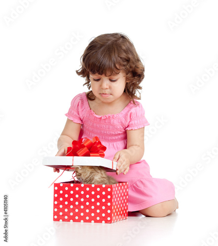 Photo: funny child with kitten in gift box funny child with kitten in gift box