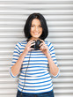 happy teenage girl in big headphones