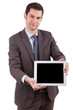 Young cuacasian businessman using a tablet pc
