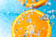 Orange splash in water, top view Orange splash in water, top view