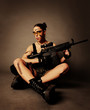 Woman with weapon.