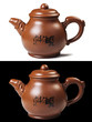 a clay teapot isolated on white background