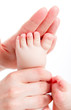 Mother massaging her baby