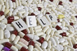 Photo: text written over pills text written over pills