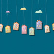 Homes made from paper on blue Homes made from paper on blue