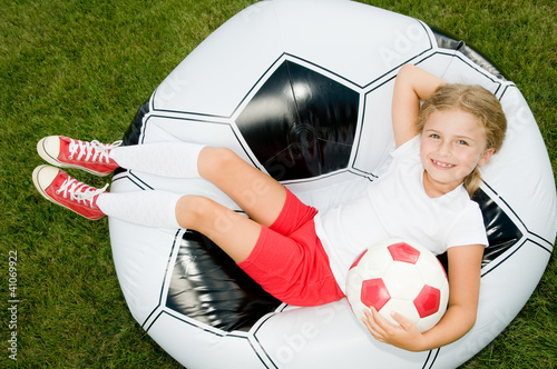 Photo: Football - portrait of young lovely footballer Football - portrait of young lovely footballer