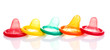 Colorful condoms isolated on white