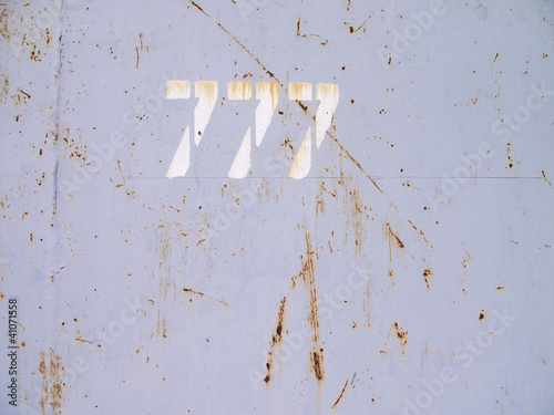 Photo: Grunde rust texture with label 777 Grunde rust texture with label 777