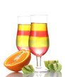 fruit jelly in glasses and fruits isolated on white fruit jelly in glasses and fruits isolated on white