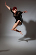 Foto: Beautiful young female jumping Beautiful young female jumping